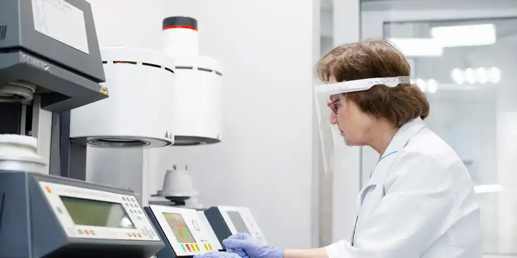 a doctor sitting in a lab
